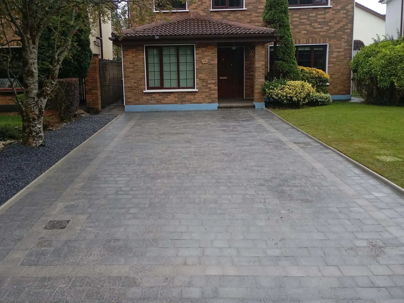 After: the finished block-paved driveway with a contrasting border