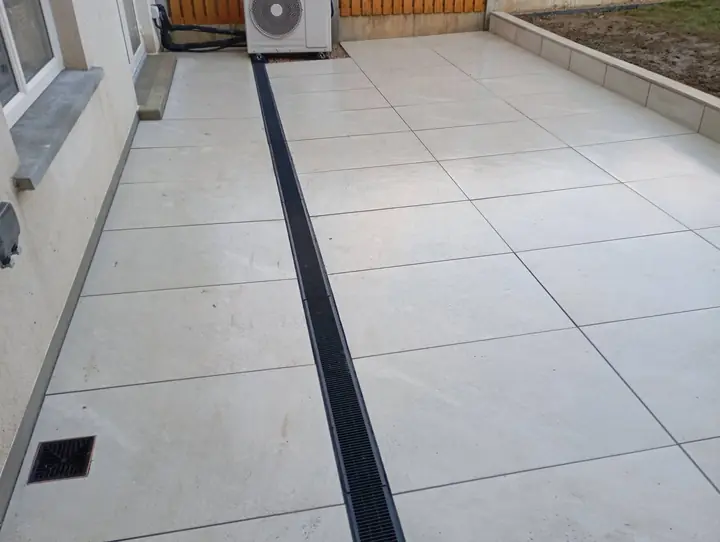 Porcelain patio with drainage channel