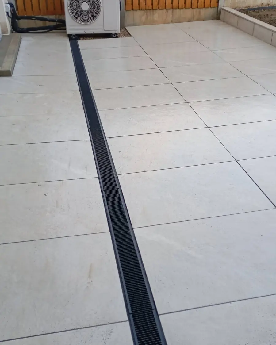 Porcelain patio with drainage channel